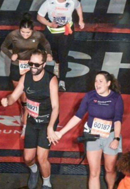 Andy and Sissy crossing the finish line at the NYC Marathon