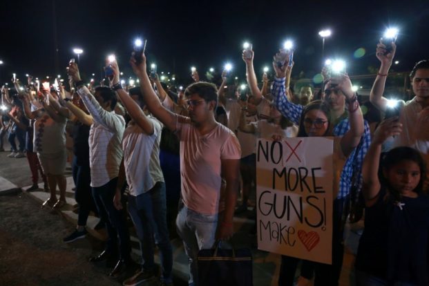 Students mourning gun violence in their schools